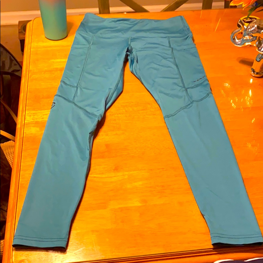 Teal Virus compression leggings